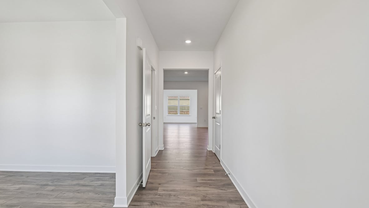 front entry way with flex spaceon the left