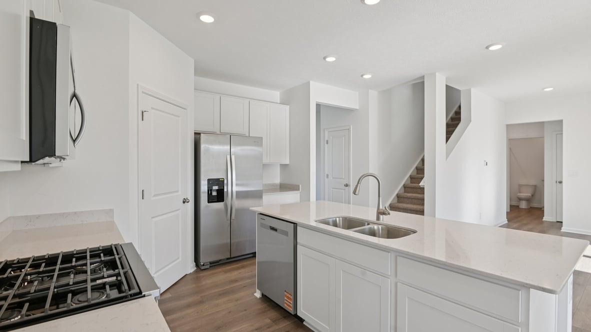 kitchen with large corner pantry