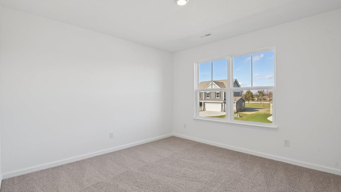 bedroom with large windows