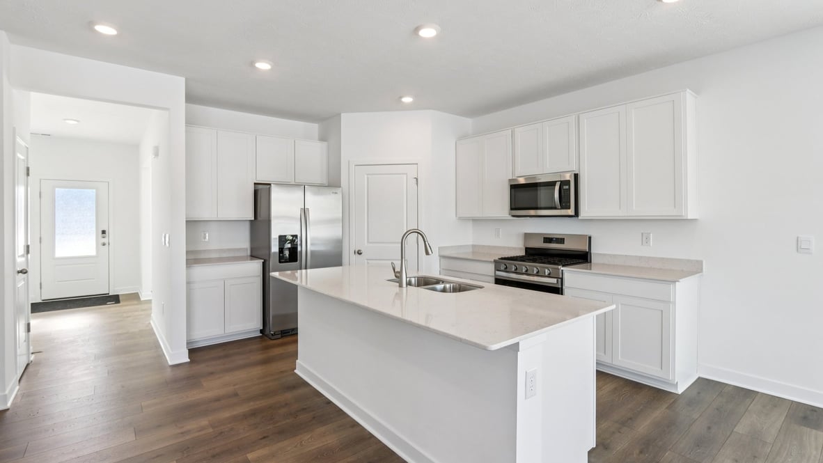 kitchen with large corne rpantry