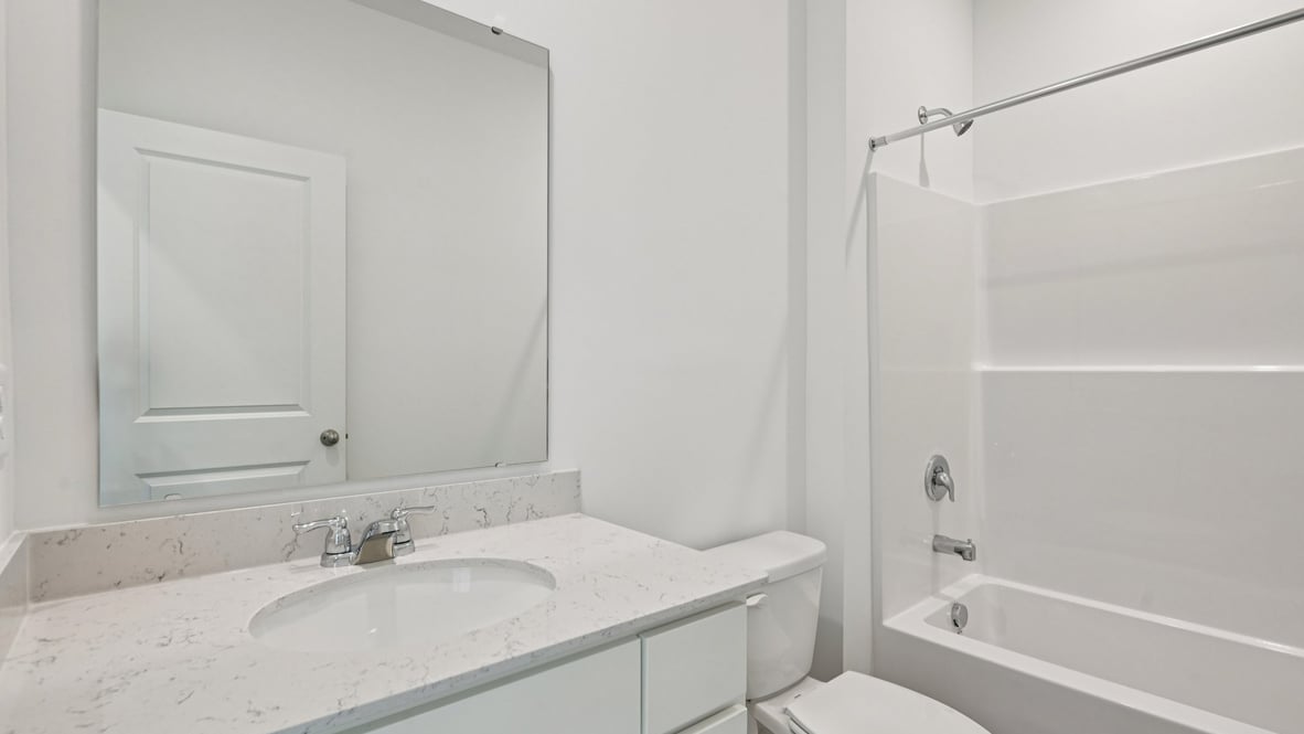 bathroom with shower and tub combo