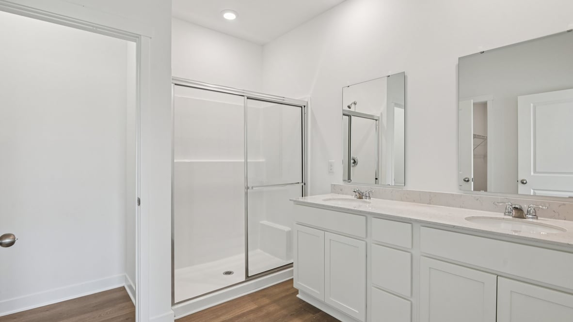 primary bathroom with walk-in shower