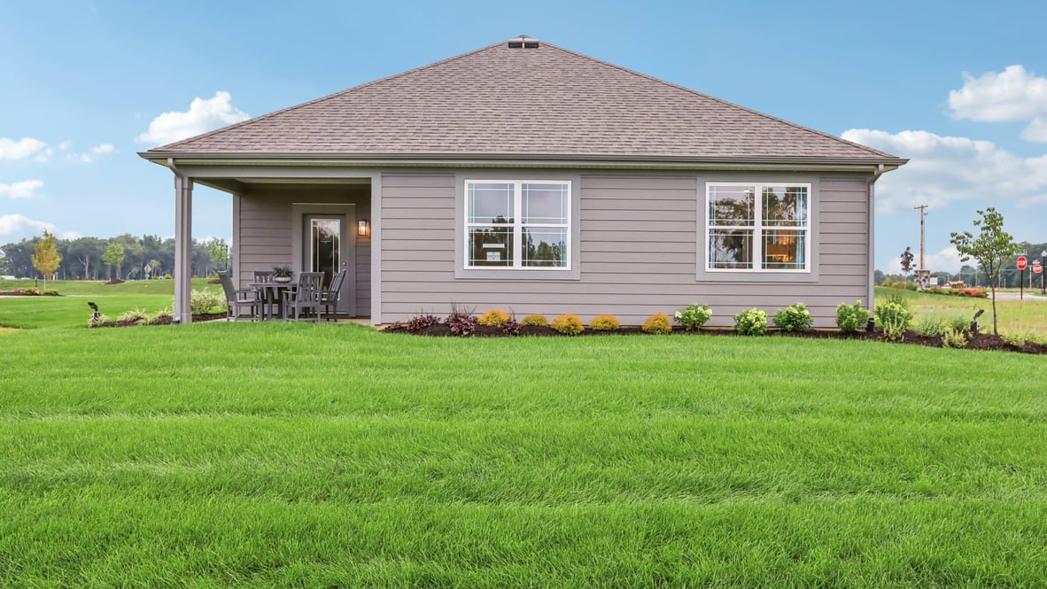 covered patio on the back of the home