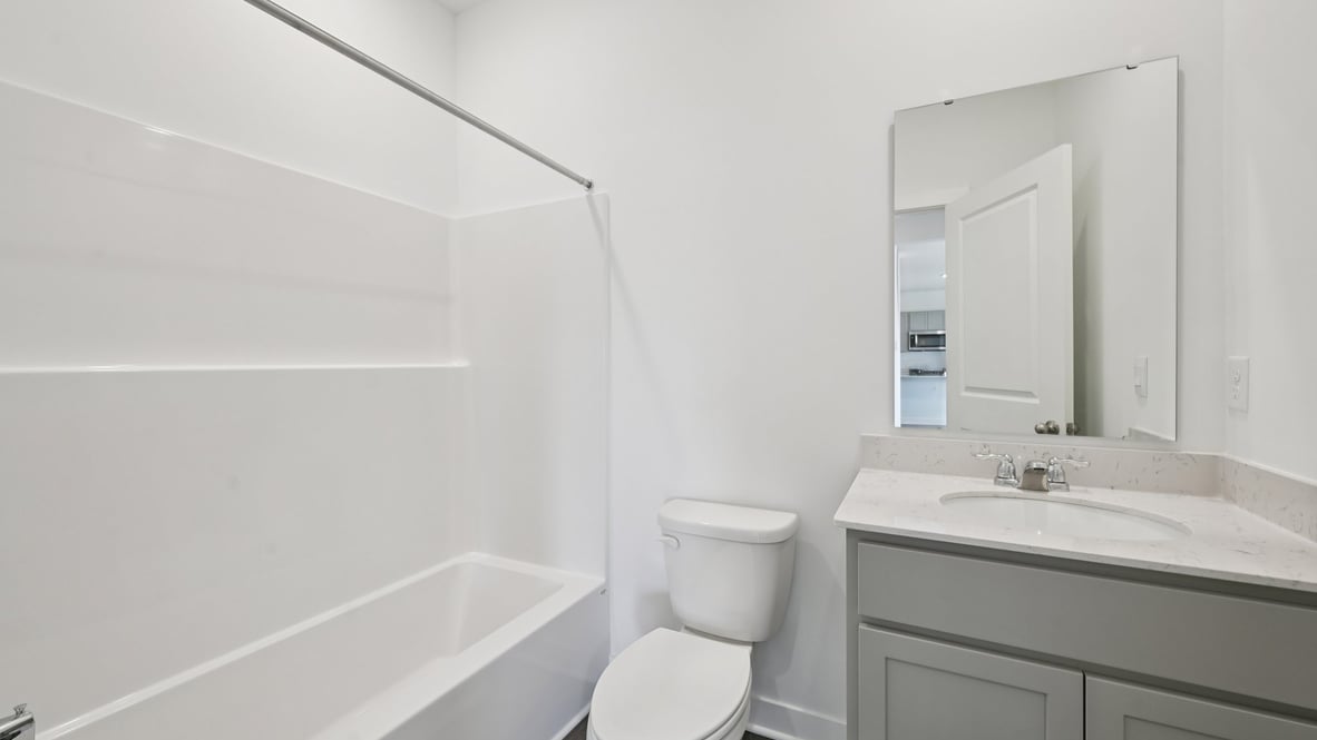 bathroom with shower and tub combo