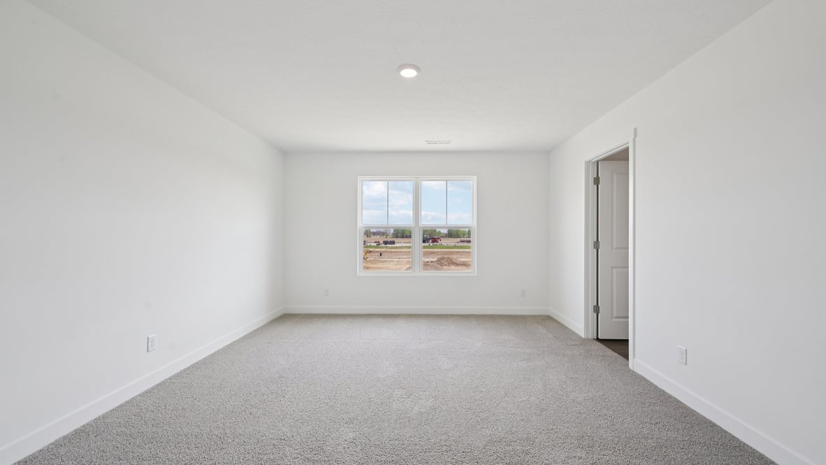 primary bedroom with large windows