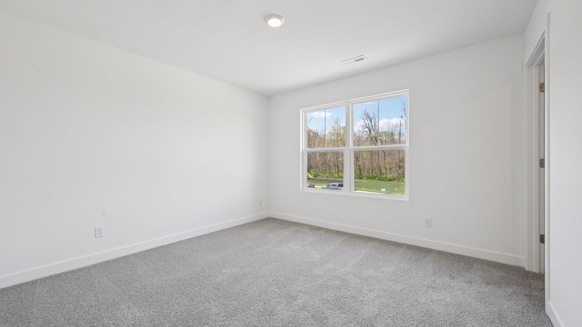 bedroom with large windows