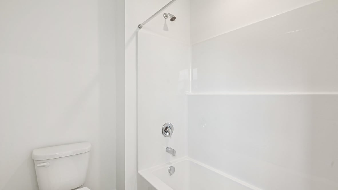 bathroom with shower and tub combo