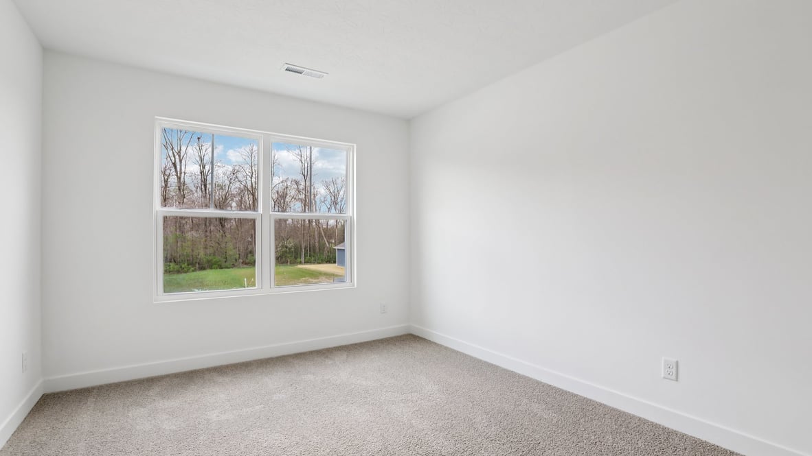 bedrom with large windows