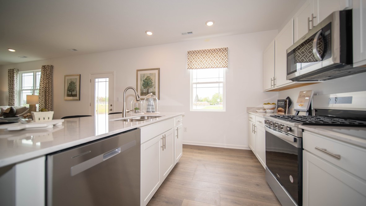 kitchen with window overlooking rear yard