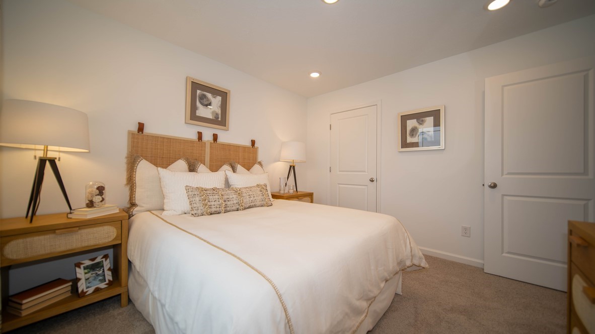 bedroom with bed, nightstand and closer