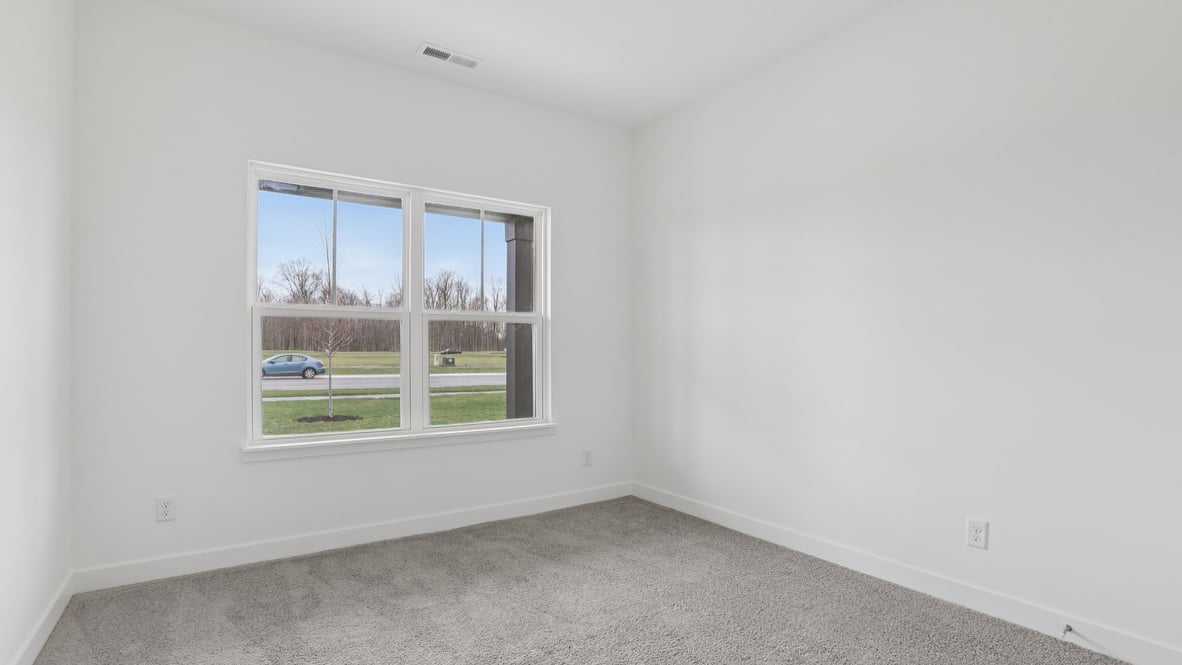 bedroom with large windows