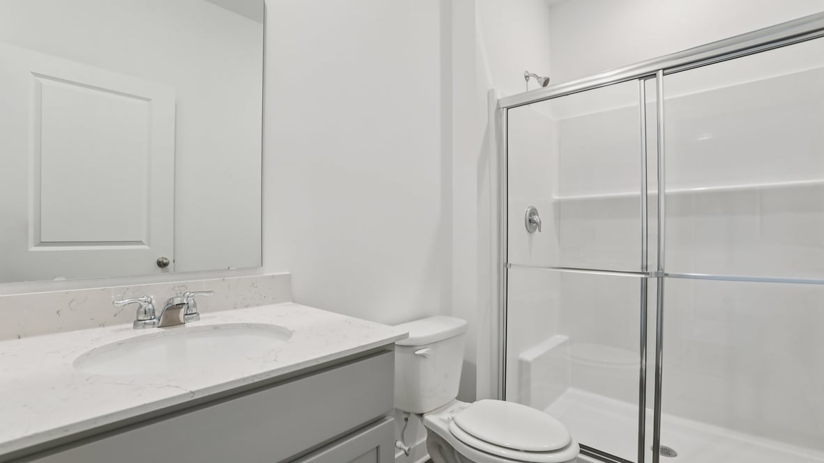 bathroom with walk-in shower