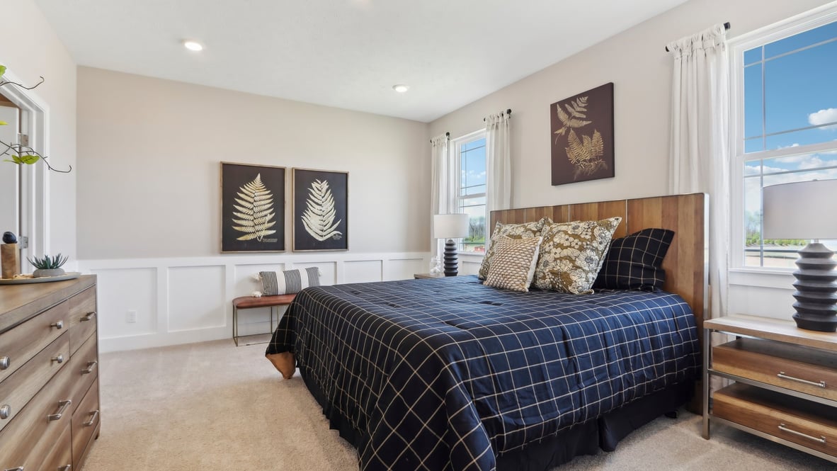 primary bedroom with large windows