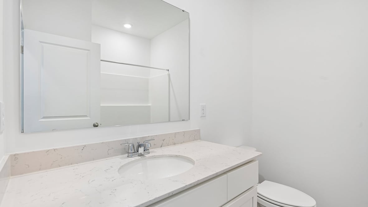 bathroom with dual vanity