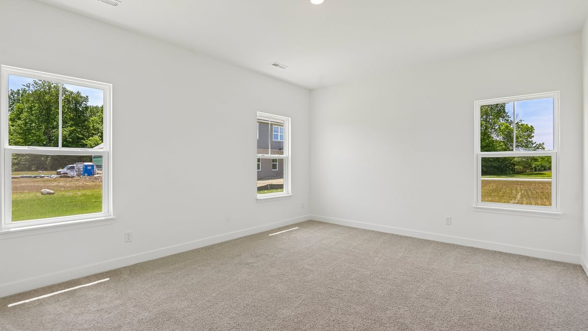 primary bedroom with large windows