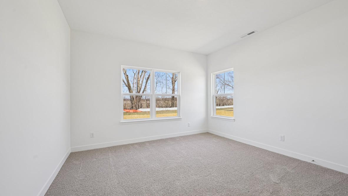 bedroom with large windows