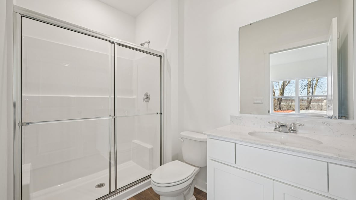 bathroom with walk-in shower