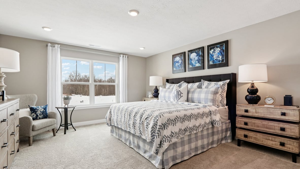 primary bedroom with large windows