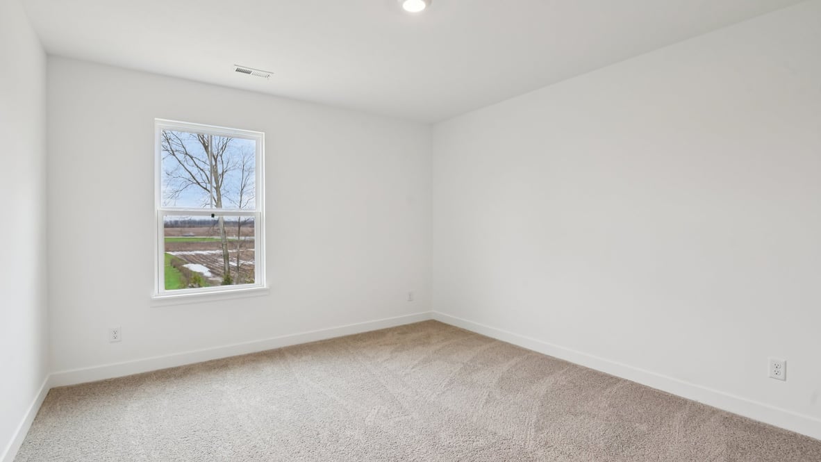 bedroom with large windows