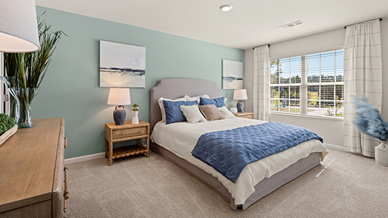 Spacious primary bedroom on second floor