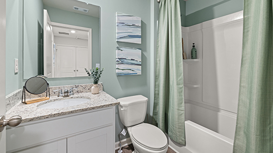 second floor bathroom with tub shower combo