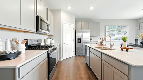 kitchen with large corner pantry