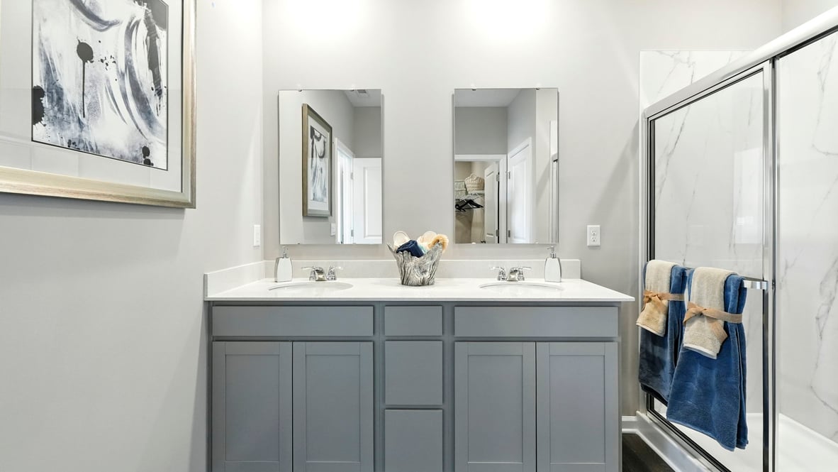 spacious primary bathroom with double vanity