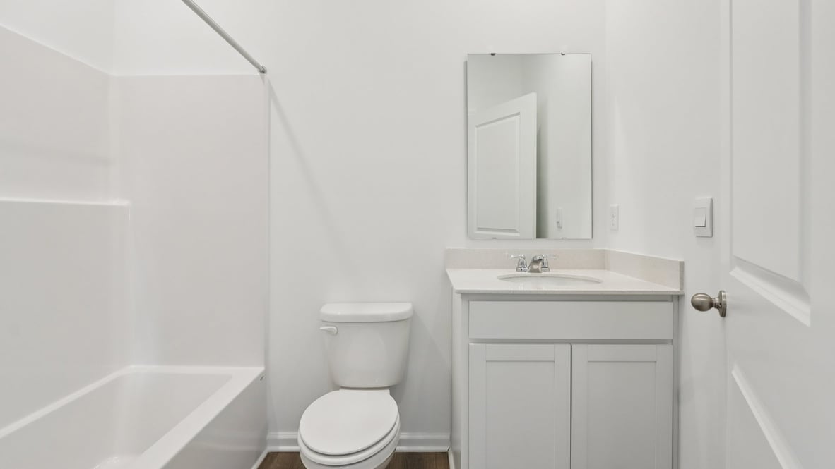 full bathroom with tub on first floor