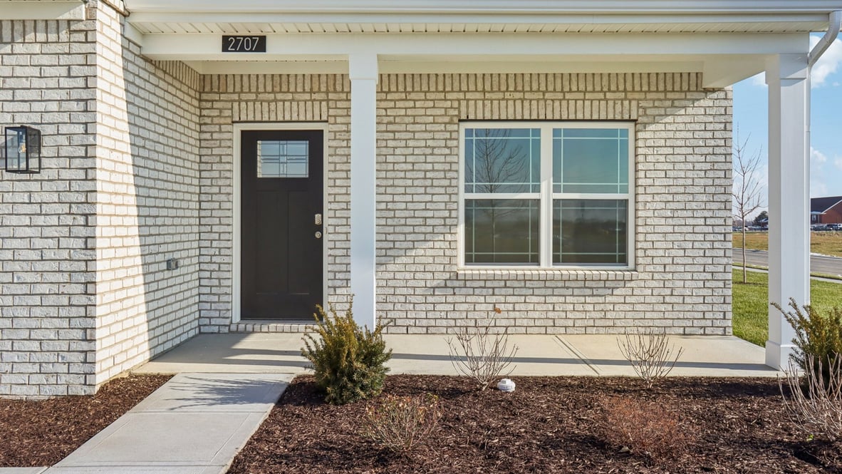 front exterior 2 story home with covered front porch