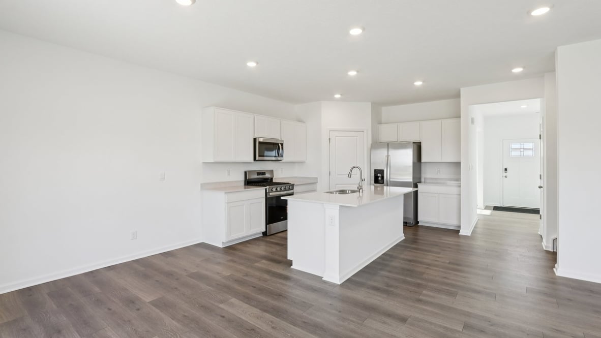 open concept kitchen and dining space