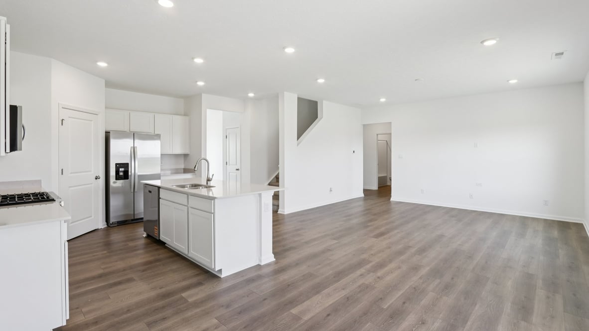 open concept dining kitchen and living space