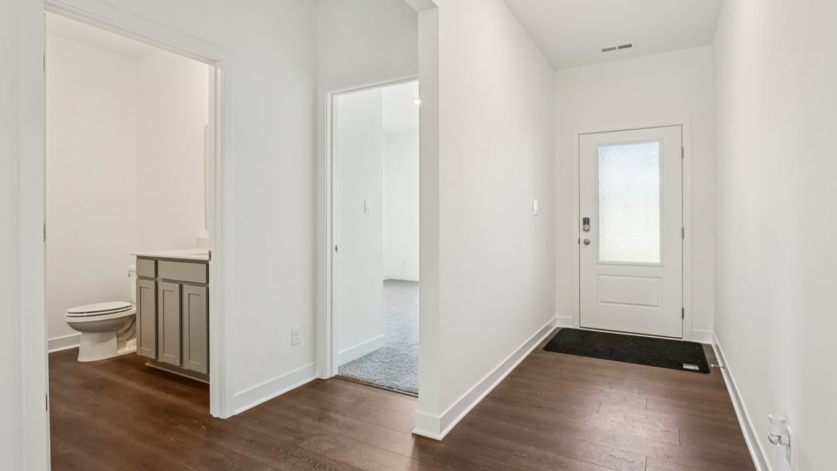 entry way foyer leading to 2 secondary bedrooms