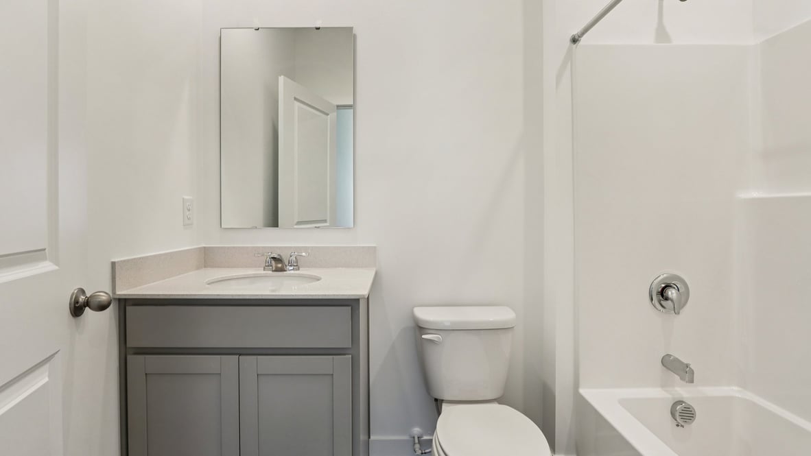 en suite full bathroom attached to bedroom 4