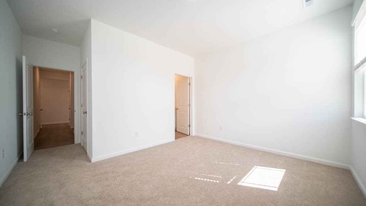 guest bedroom with spacious closet