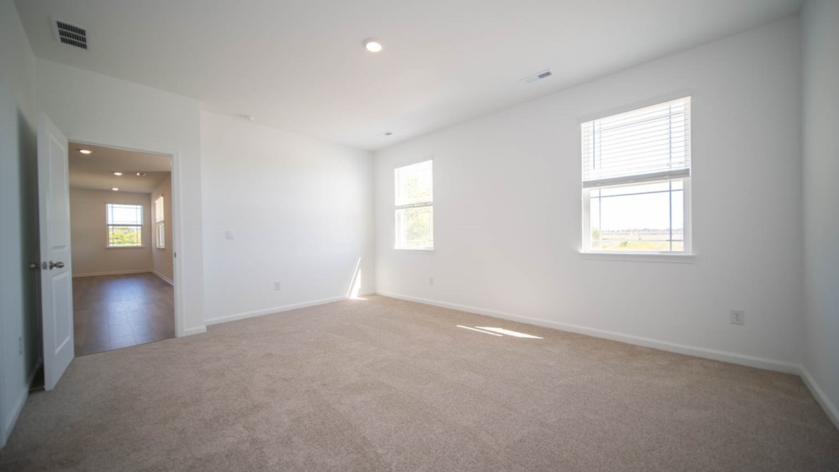 primary bedroom with natural light