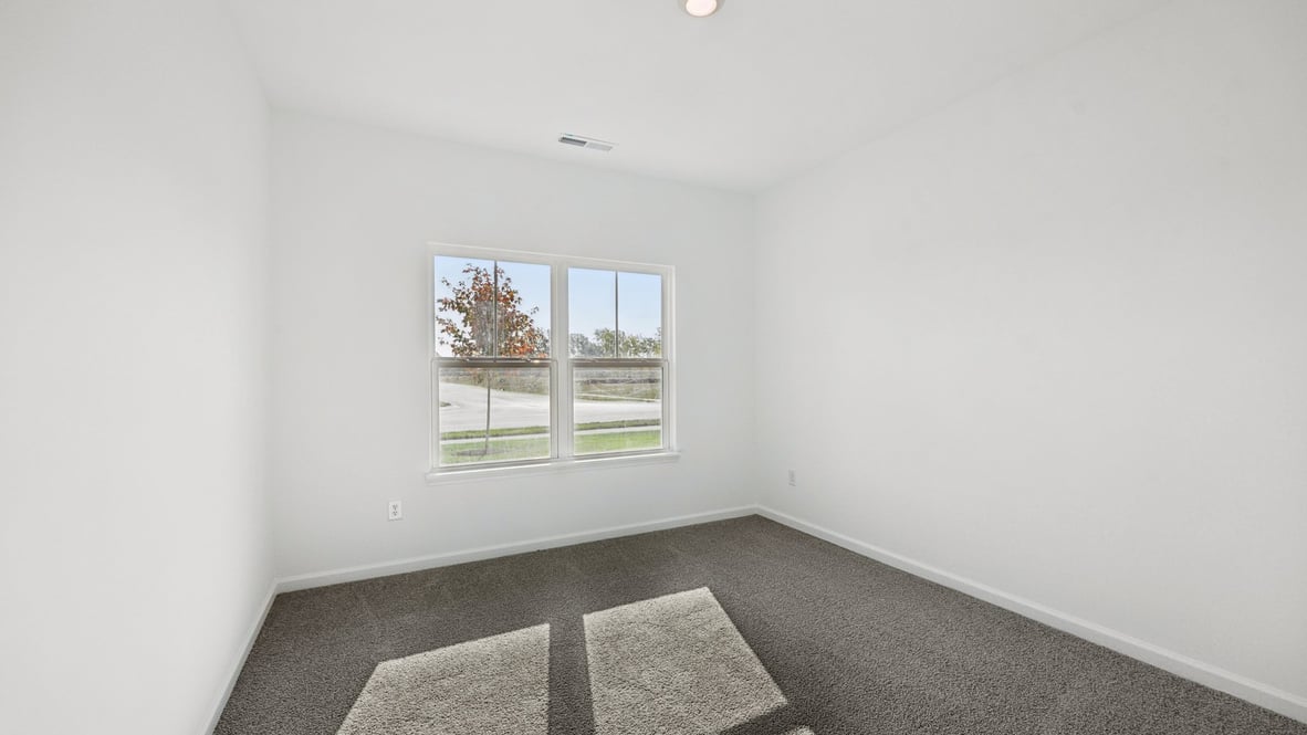 bedroom with large windows