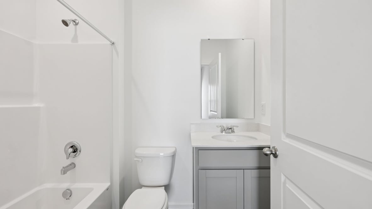 bathroom with shower and tub combo