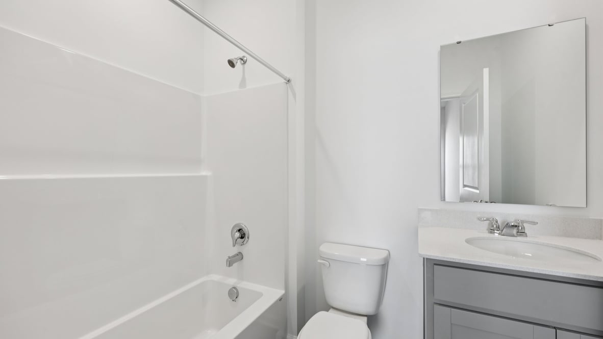 bathroom with shower and tub combo