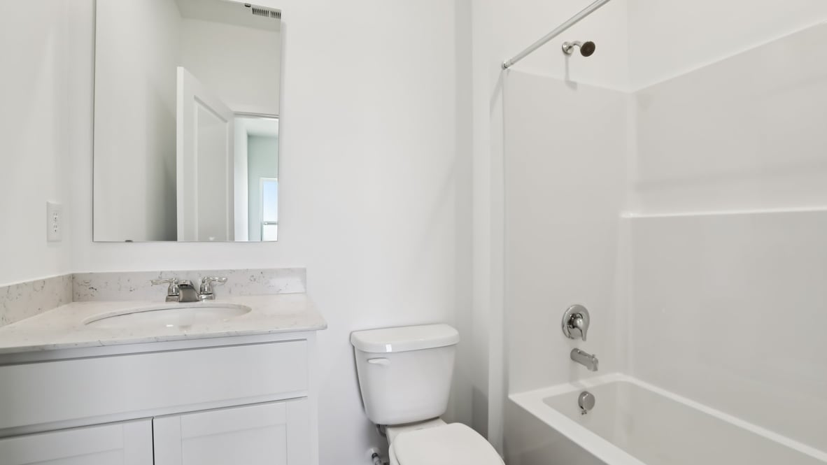 bathroom with shower and tub combo