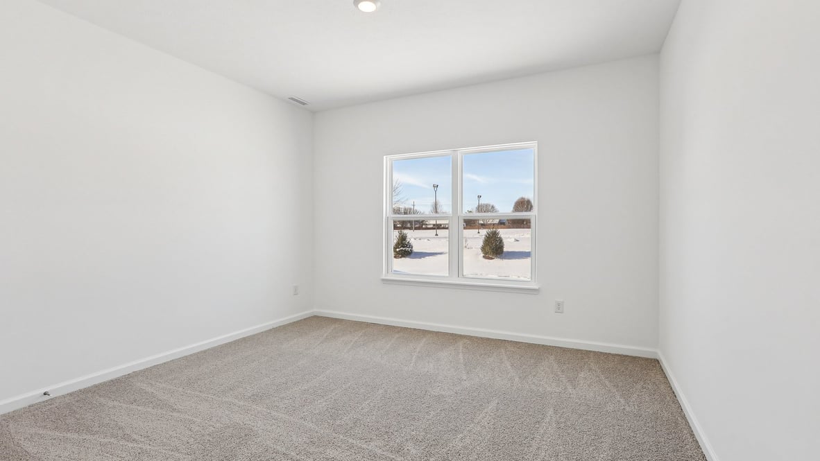 bedroom with large windows