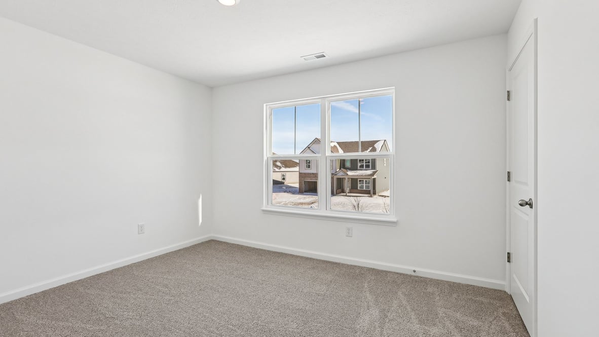 bedroom with large windows