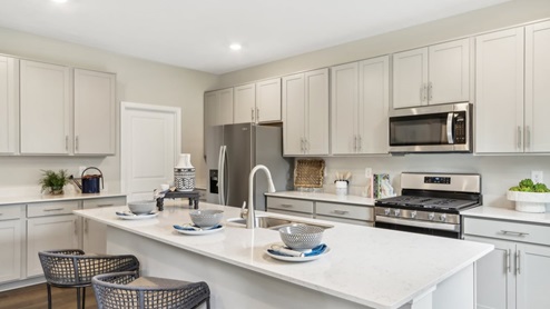 kitchen with large corner pantry