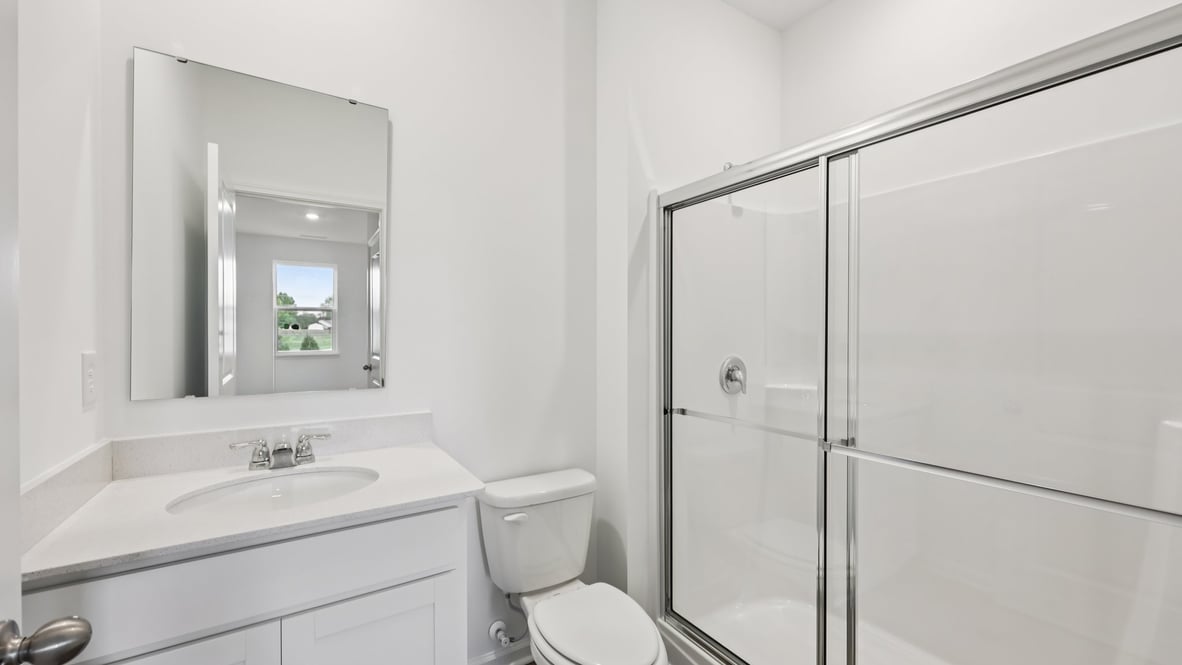 bathroom with walk-in shower