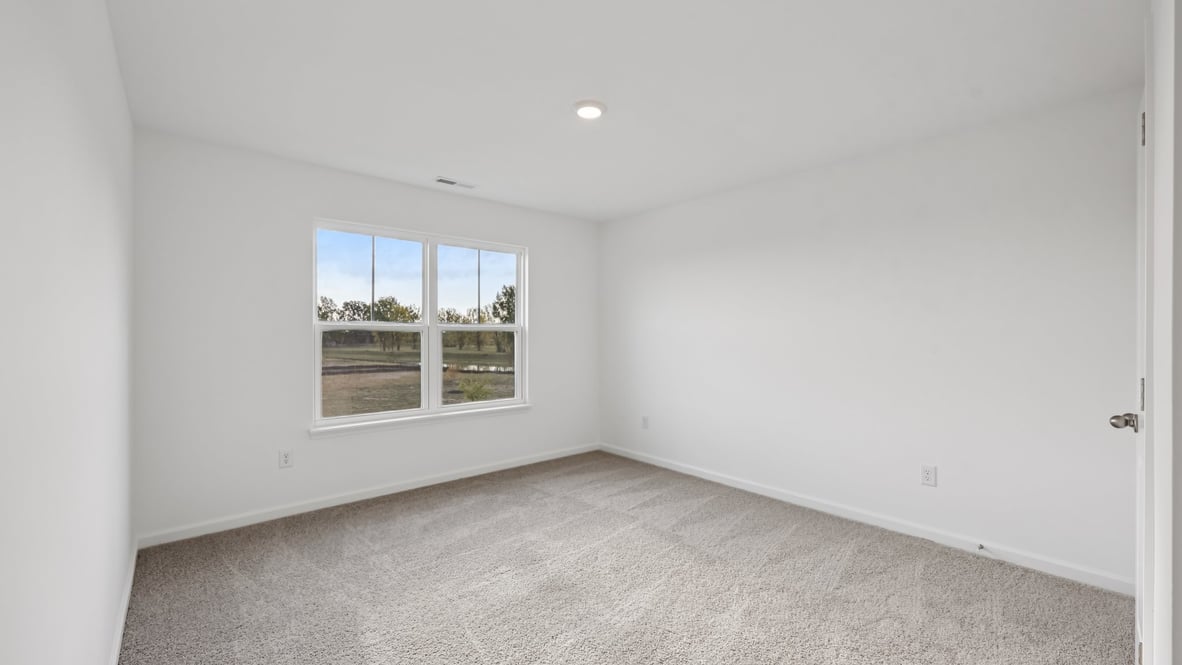 bedroom with large windows