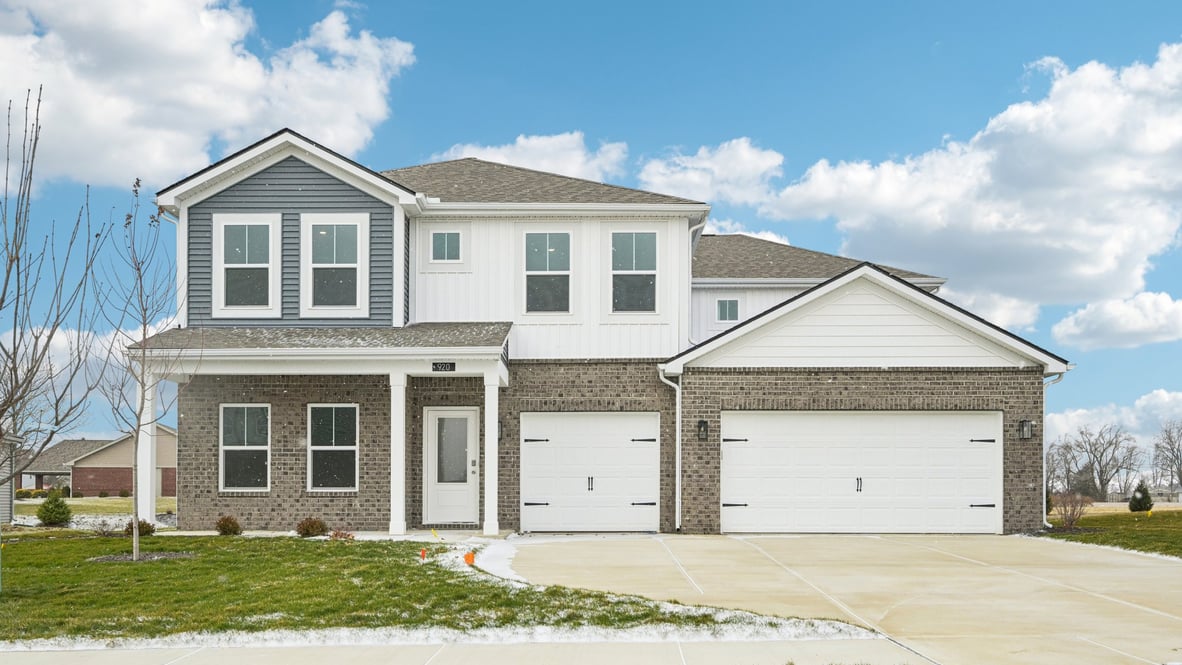front exterior view of the home with 3-car garage