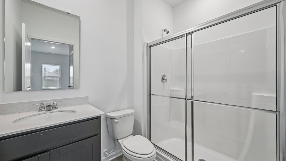 bathroom with walk-in shower