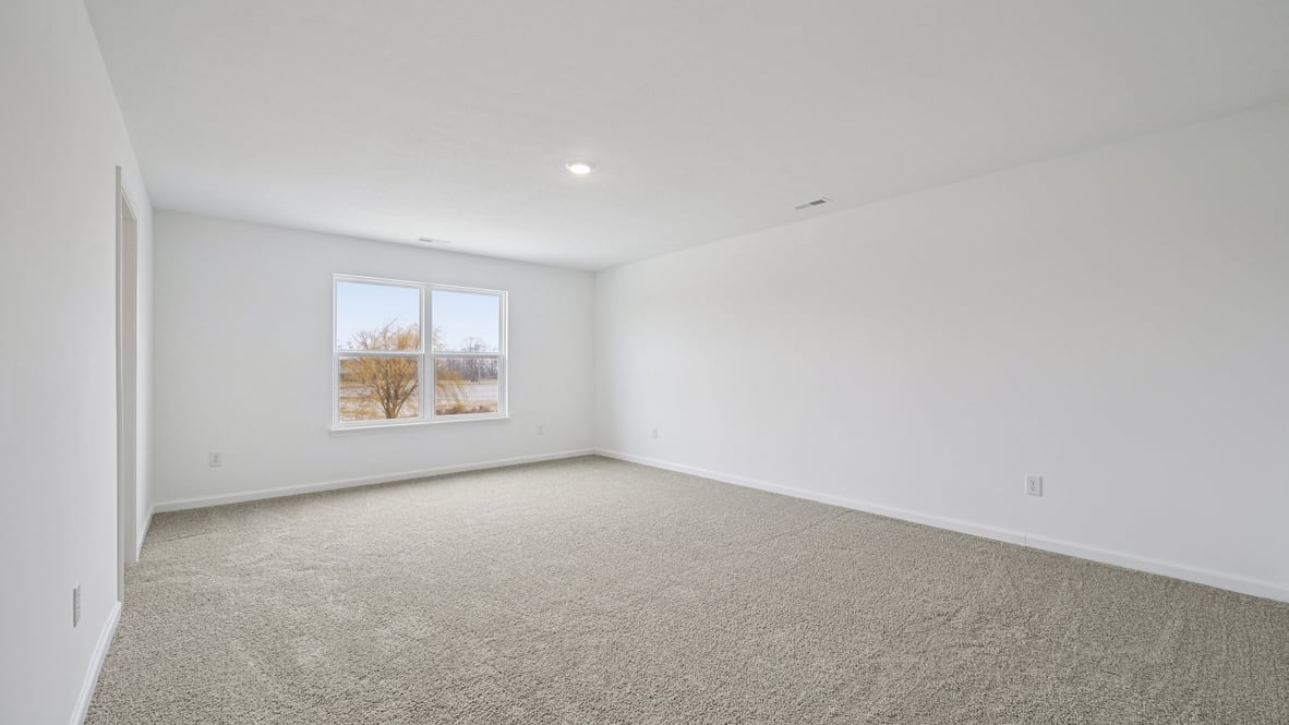 primary bedroom with large windows