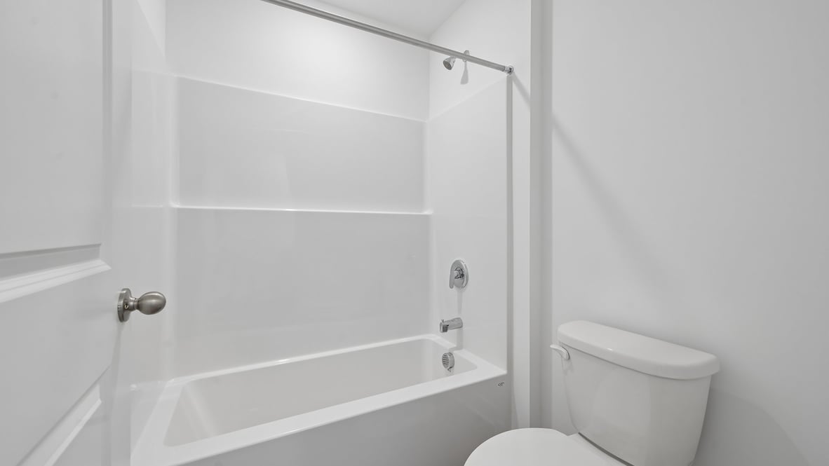 bathroom with shower and tub combo