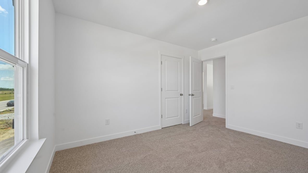 bedroom with spacious closet