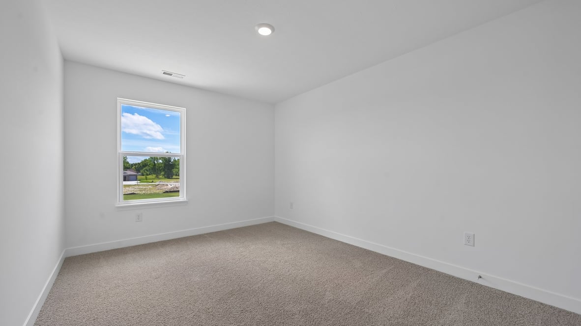 bedroom with large windows